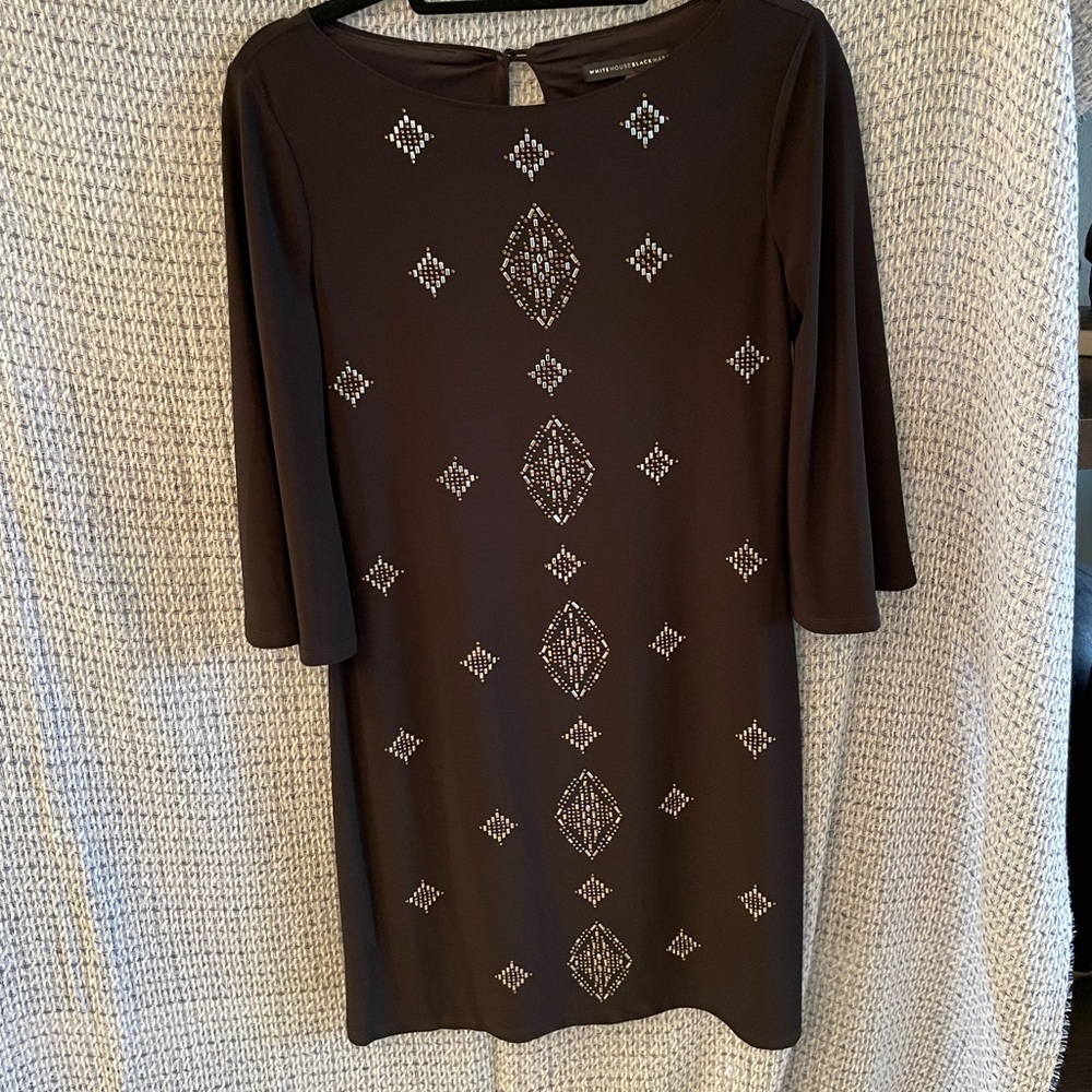 White House black market dress black with sequined embellishments.
